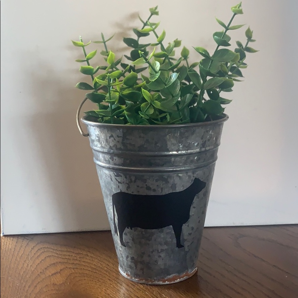 Galvanized bucket with cow and greenery farmhouse